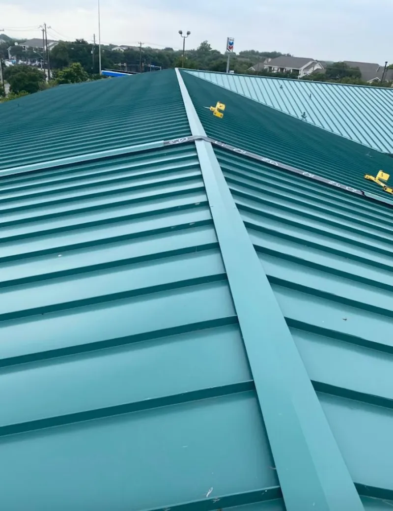 Green commercial metal roof ridge and valley for Metal Roof Repair in Jonesboro